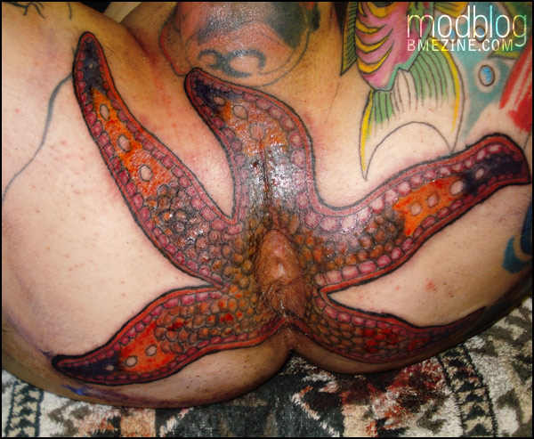 Anal starfish tattoo.